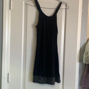Black short dress with silver design on bottom